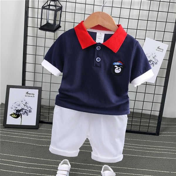 Red Collared Half Sleeves Blue T-Shirt & White Shorts Set 
From 1-6 Years